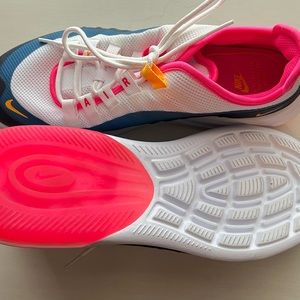 NIKE sneakers never worn, white,blue and red. Air shoes